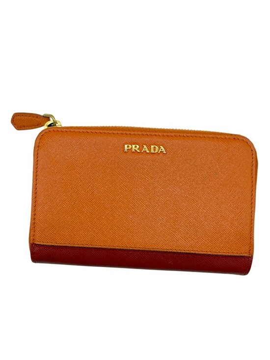 Prada Handbags - Prada Orange/Red Saffiano Leather Bicolor Zip Around Wallet featuring a gold log